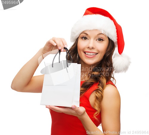 Image of woman in red dress with shopping bag