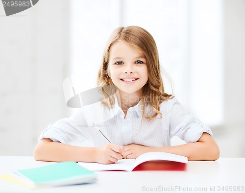 Image of student girl studying at school