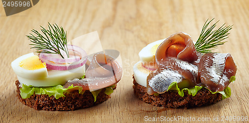 Image of sandwiches with anchovies and egg