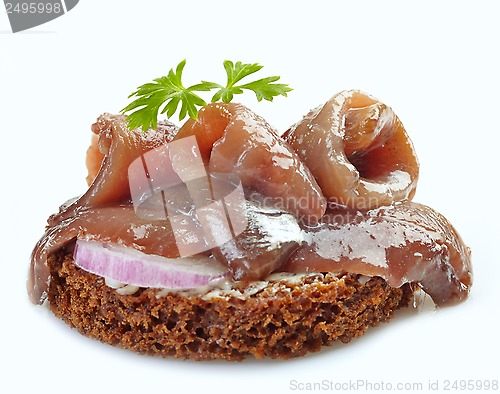 Image of brown bread sandwich with anchovies