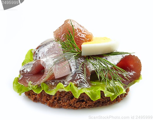 Image of brown bread sandwich with anchovies