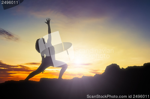 Image of yoga woman sunrise