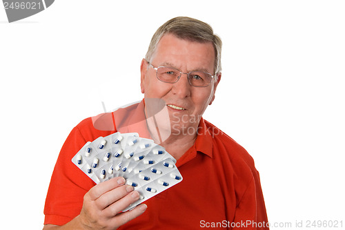 Image of Senior man holding medicaments