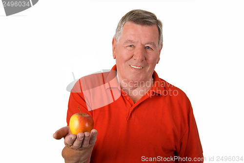 Image of Old man holding an apple