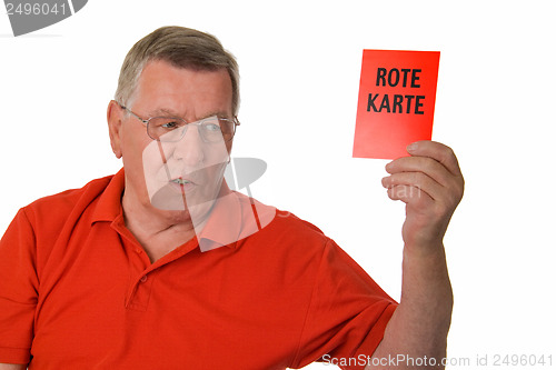 Image of Old man showing red card