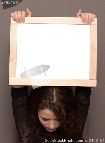 Image of woman with frame