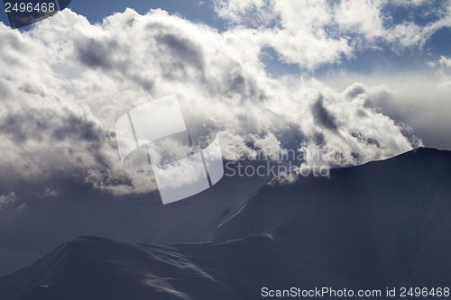 Image of Evening winter mountain in haze