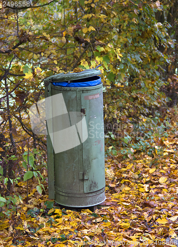 Image of autumn scenery with rubbish bin