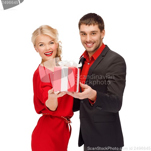 Image of smiling woman and man with gift box