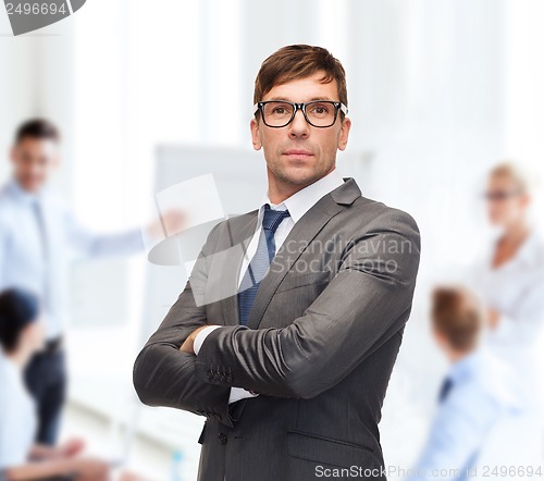 Image of attractive buisnessman or teacher in glasses