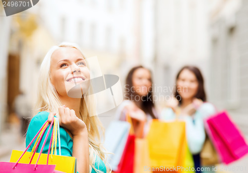 Image of girls with shopping bags in ctiy