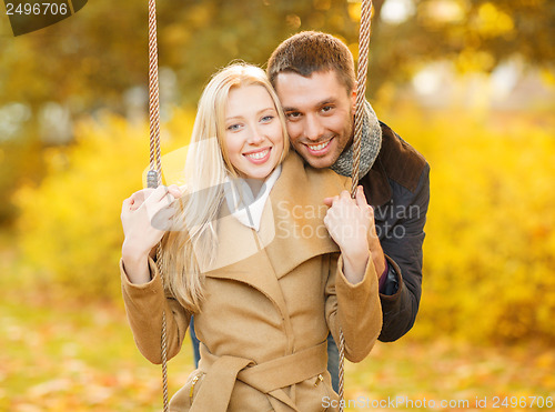 Image of romantic couple in the autumn park
