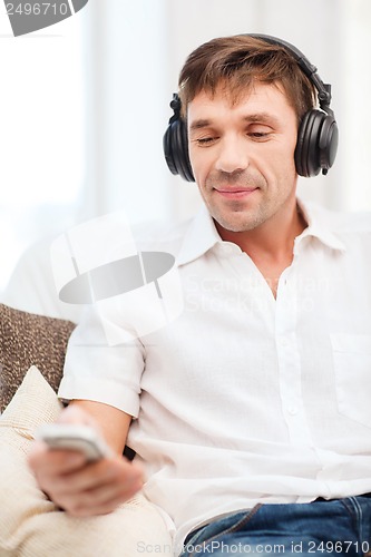 Image of man with headphones listening to music