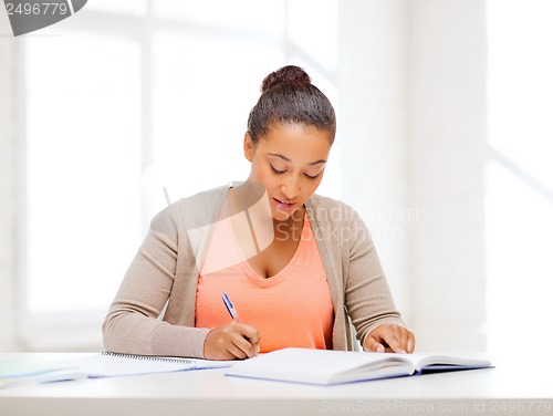 Image of international student studying in college