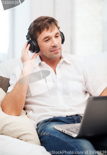 Image of man with headphones listening to music