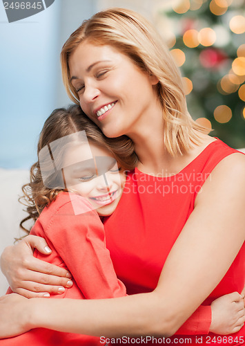 Image of hugging mother and daughter