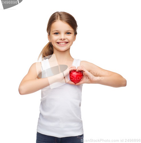 Image of girl in blank white shirt with small red heart