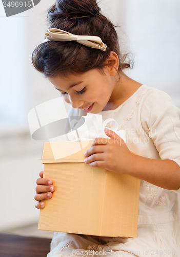 Image of happy child girl with gift box