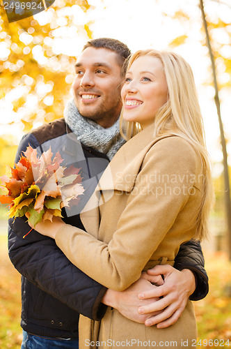 Image of romantic couple in the autumn park