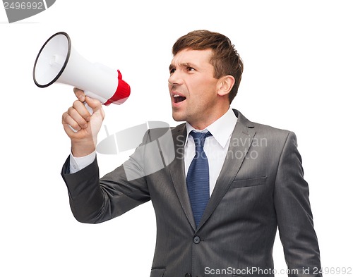 Image of buisnessman with bullhorn or megaphone