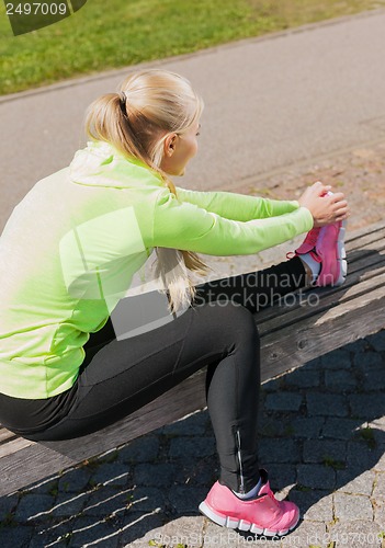 Image of woman doing sports outdoors