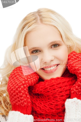 Image of teenage girl in red mittens and scarf