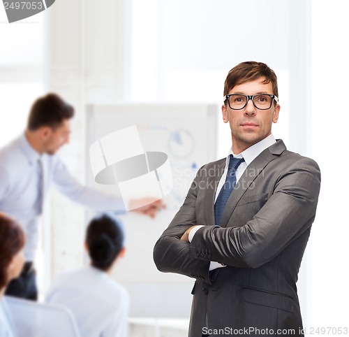 Image of attractive buisnessman or teacher in glasses