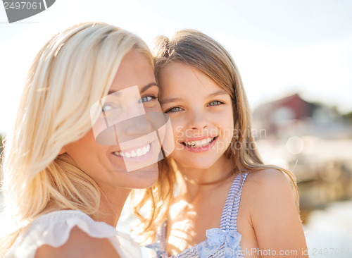 Image of happy mother and child girl