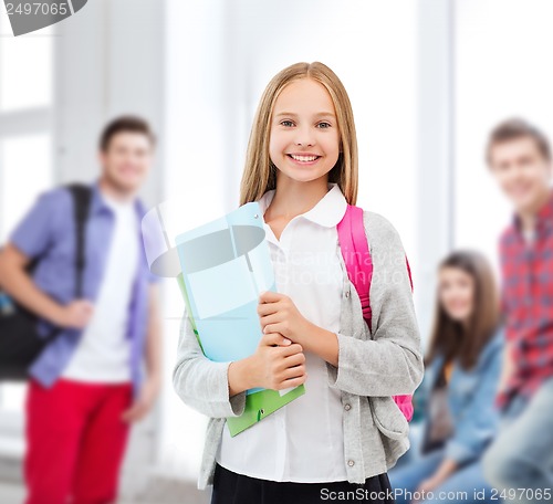 Image of happy and smiling teenage girl