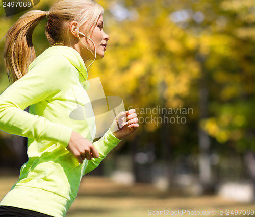 Image of woman doing running outdoors