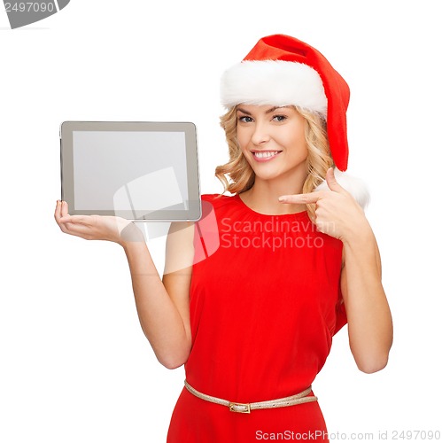 Image of woman in santa helper hat with tablet pc