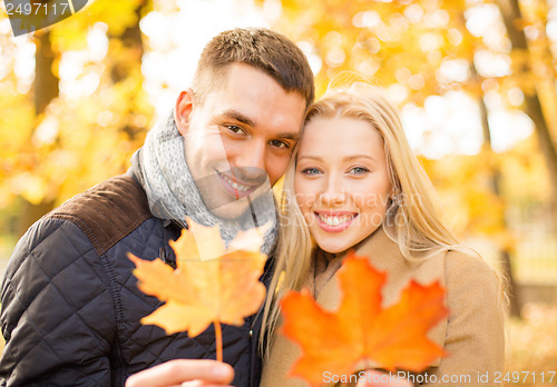 Image of romantic couple in the autumn park