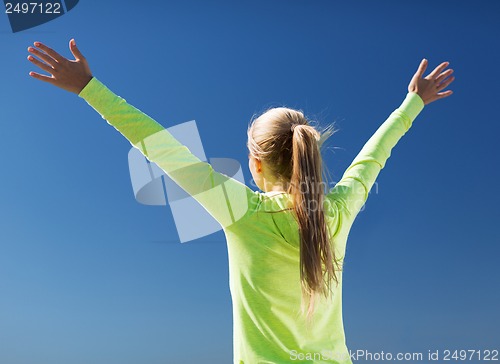 Image of woman doing sports outdoors