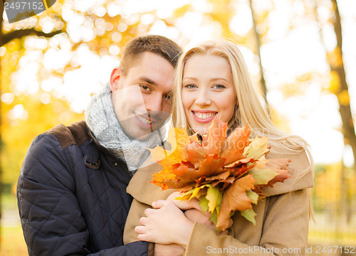 Image of romantic couple in the autumn park