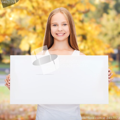 Image of little girl with blank white board