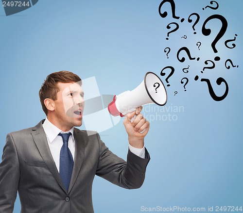 Image of buisnessman with bullhorn or megaphone