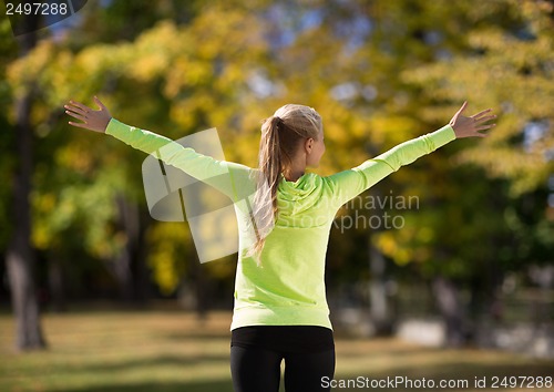 Image of woman doing sports outdoors
