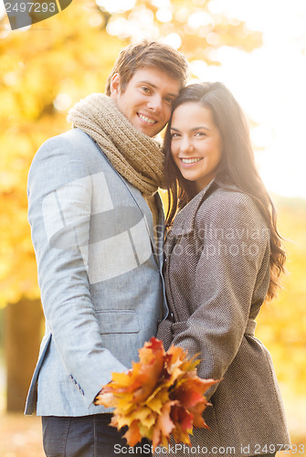 Image of romantic couple in the autumn park