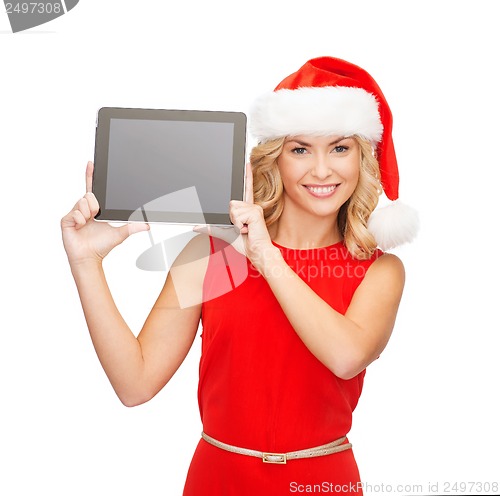 Image of woman in santa helper hat with tablet pc