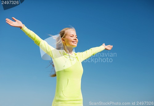 Image of woman doing sports outdoors