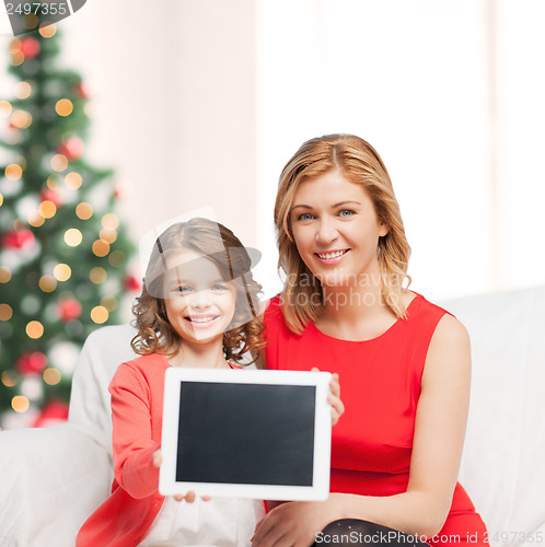 Image of mother and daughter with tablet pc