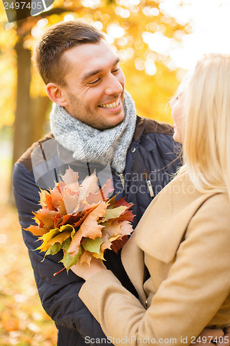 Image of romantic couple in the autumn park