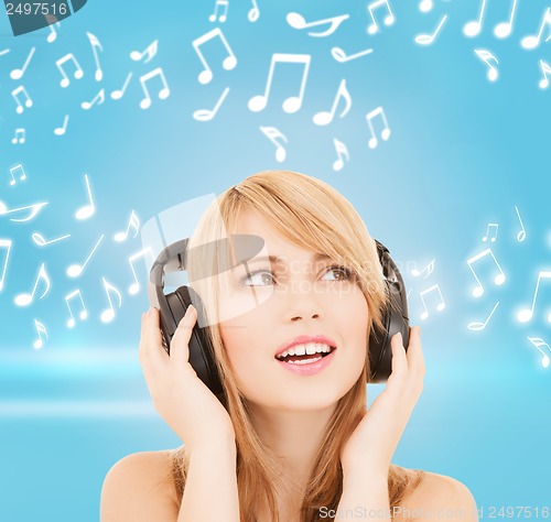 Image of happy girl with headphones