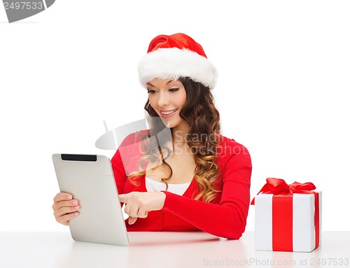 Image of woman with gift box and tablet pc computer