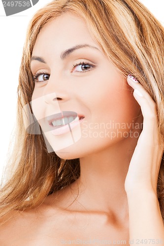 Image of face and hands of happy woman with long hair