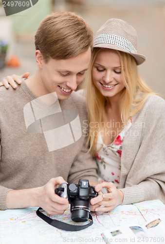 Image of couple with photo camera