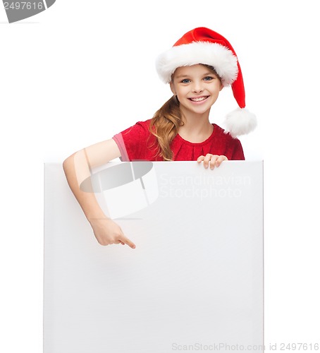 Image of woman in santa helper hat with blank white board