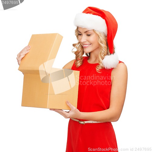 Image of smiling woman in santa helper hat with gift box