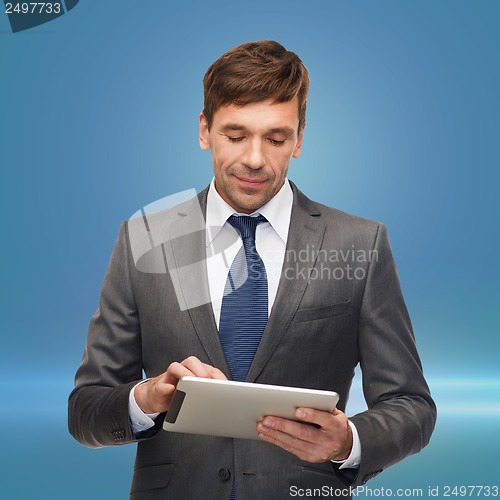 Image of buisnessman with tablet pc