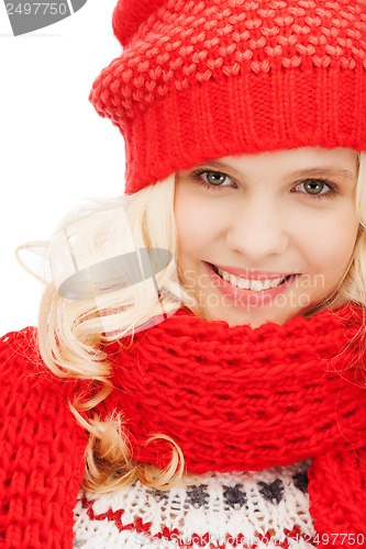 Image of teenage girl in red hat and scarf